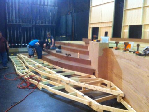 Process shot of all of the frames for the stairs being skinned with plywood and hardboard.